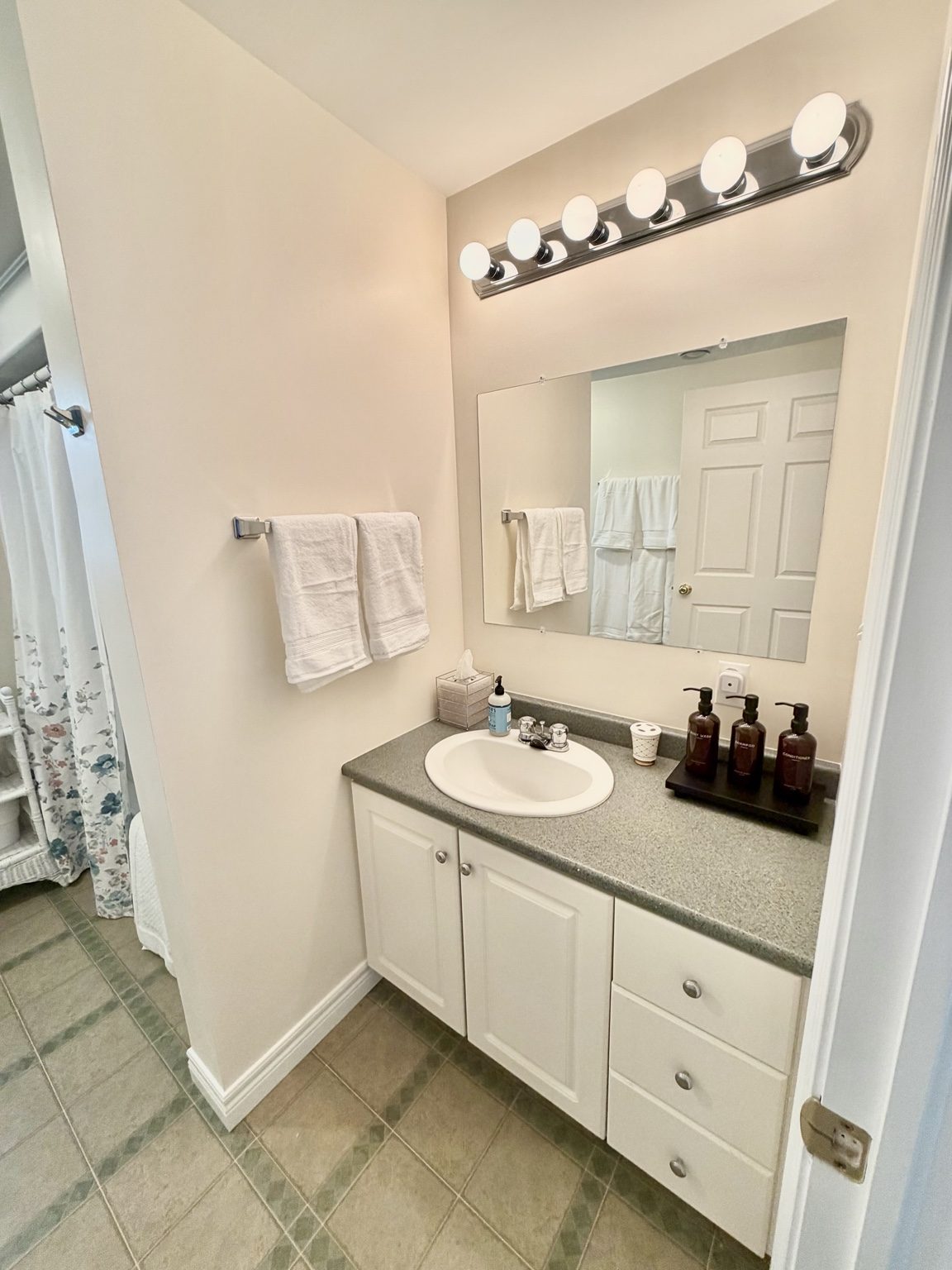 Bathroom vanity and towel area at Ledge & Tide