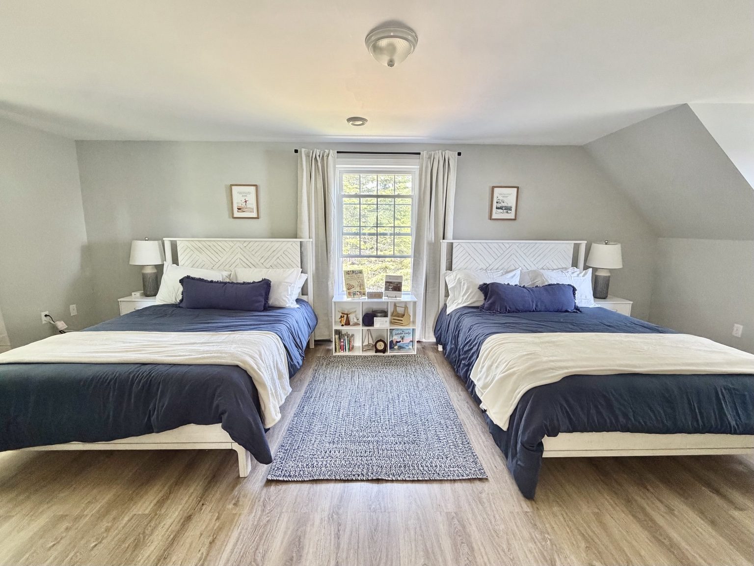 The McCloskey Room twin queen beds at Ledge & Tide
