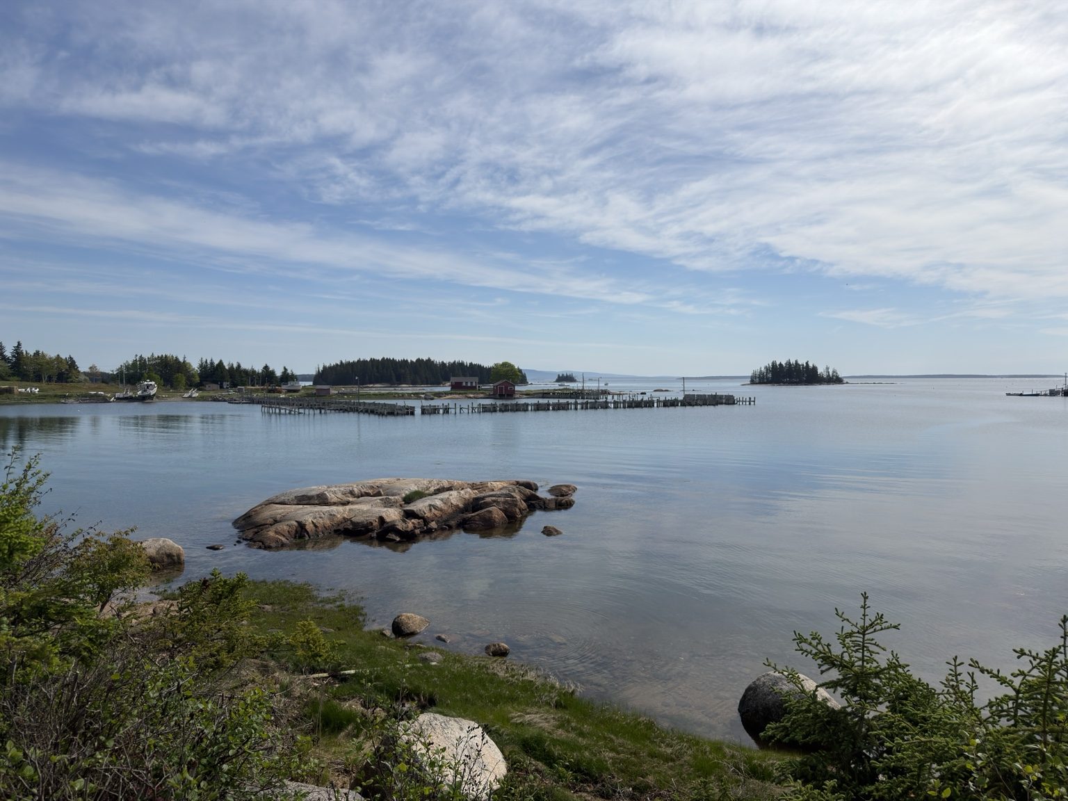 High tide view of the shoreline at Ledge & Tide